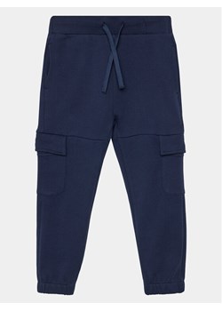 United Colors Of Benetton Joggery 3J68GF03K Granatowy Regular Fit ze sklepu MODIVO w kategorii Spodnie chłopięce - zdjęcie 181153966