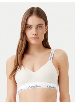 Calvin Klein Underwear Biustonosz bezfiszbinowy 000QF7059E Beżowy ze sklepu MODIVO w kategorii Biustonosze - zdjęcie 181154679