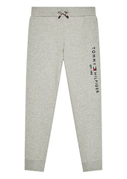 Tommy Hilfiger Spodnie dresowe Essential KS0KS00214 Szary Regular Fit ze sklepu MODIVO w kategorii Spodnie chłopięce - zdjęcie 181155037