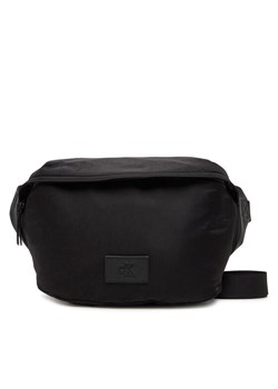 Calvin Klein Jeans Saszetka nerka Metro Nylon Oversized Waistbag LV04G3088G Czarny - id: 8721107872629 - marki Calvin Klein - 181155045 Calvin Klein Jeans Saszetka nerka Metro Nylon Oversized Waistbag LV04G3088G Czarny ze sklepu MODIVO w kategorii Nerki - zdjęcie 181155045