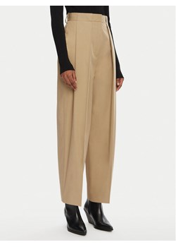 Balmain Spodnie materiałowe DF0PQ315CF47 Beżowy Regular Fit ze sklepu MODIVO w kategorii Spodnie damskie - zdjęcie 181156375