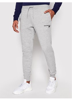 New Balance Spodnie dresowe C C F Pant MP03904 Szary Athletic Fit ze sklepu MODIVO w kategorii Spodnie męskie - zdjęcie 181156416