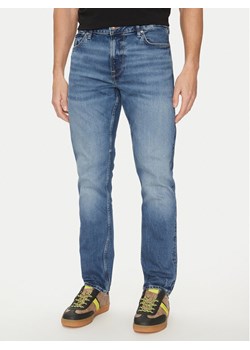 Guess Jeansy M5RAS2 D5KP2 Niebieski Slim Fit ze sklepu MODIVO w kategorii Jeansy męskie - zdjęcie 181156786