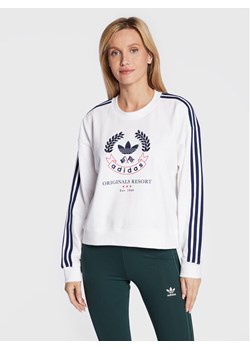 adidas Bluza Graphic HL6558 Biały Loose Fit ze sklepu MODIVO w kategorii Bluzy damskie - zdjęcie 181158638