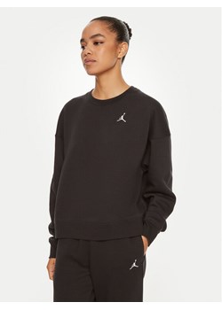 Nike Bluza Brooklyn FN4491 Czarny Relaxed Fit ze sklepu MODIVO w kategorii Bluzy damskie - zdjęcie 181158669