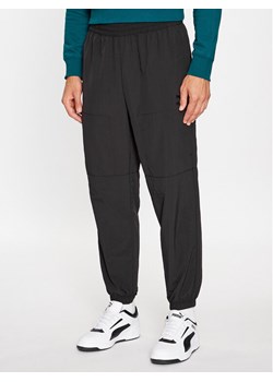 Puma Spodnie dresowe Classics Utility 622668 Czarny Regular Fit ze sklepu MODIVO w kategorii Spodnie męskie - zdjęcie 181159558