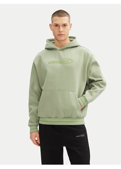 Karl Kani Bluza Ellipse 60210339 Zielony Regular Fit ze sklepu MODIVO w kategorii Bluzy męskie - zdjęcie 181160376