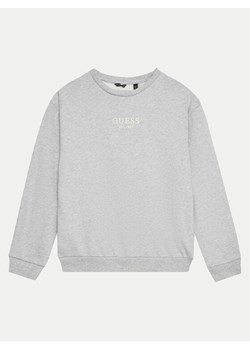 Guess Bluza L4BQ28 KAV33 Szary Regular Fit ze sklepu MODIVO w kategorii Bluzy chłopięce - zdjęcie 181161195