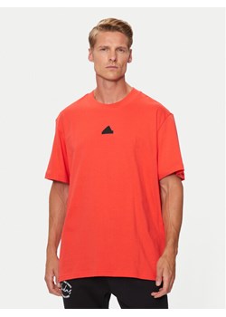 adidas T-Shirt Brand Love IW3540 Pomarańczowy Loose Fit ze sklepu MODIVO w kategorii T-shirty męskie - zdjęcie 181162055