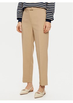 Tommy Hilfiger Chinosy WW0WW44090 Beżowy Regular Fit ze sklepu MODIVO w kategorii Spodnie damskie - zdjęcie 181163785