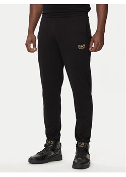 EA7 Emporio Armani Spodnie dresowe 8NPP66 PJVRZ 0208 Czarny Regular Fit ze sklepu MODIVO w kategorii Spodnie męskie - zdjęcie 181166836
