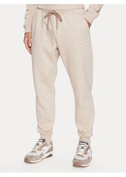 Columbia Spodnie dresowe Marble Canyon™ Heavyweight Fleece Pant Brązowy Regular Fit ze sklepu MODIVO w kategorii Spodnie męskie - zdjęcie 181166936