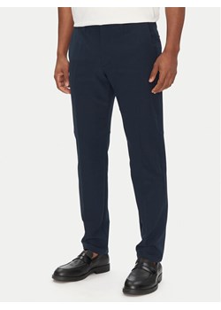 BOSS Spodnie materiałowe T_Commuter-Slim 50534303 Granatowy Slim Fit ze sklepu MODIVO w kategorii Spodnie męskie - zdjęcie 181168455