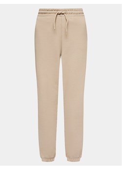 Alpha Industries Spodnie dresowe Essentials 146050 Beżowy Relaxed Fit ze sklepu MODIVO w kategorii Spodnie damskie - zdjęcie 181170989