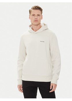Calvin Klein Bluza Micro Logo K10K109927 Beżowy Regular Fit ze sklepu MODIVO w kategorii Bluzy męskie - zdjęcie 181171558