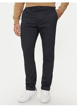 Tommy Hilfiger Chinosy MW0MW35638 Granatowy Slim Fit ze sklepu MODIVO w kategorii Spodnie męskie - zdjęcie 181173216