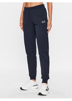EA7 Emporio Armani Spodnie dresowe 8NTP85 TJCQZ 0555 Granatowy Regular Fit ze sklepu MODIVO w kategorii Spodnie damskie - zdjęcie 181173889
