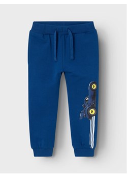 NAME IT Spodnie dresowe BATMAN Jacobo 13225935 Niebieski Regular Fit ze sklepu MODIVO w kategorii Spodnie i półśpiochy - zdjęcie 181173979