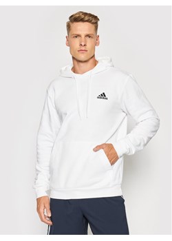 adidas Bluza FeelCozy Hoodie H12211 Biały Regular Fit ze sklepu MODIVO w kategorii Bluzy męskie - zdjęcie 181174088