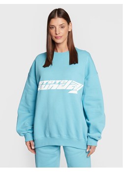 ROTATE Bluza Iriiis RT2024 Niebieski Relaxed Fit ze sklepu MODIVO w kategorii Bluzy damskie - zdjęcie 181175238