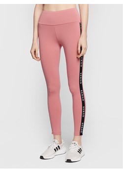 Guess Legginsy Aline V2YB14 KABR0 Różowy Slim Fit ze sklepu MODIVO w kategorii Spodnie damskie - zdjęcie 181176439