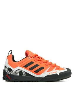 adidas Sneakersy Terrex Swift Solo 2 IE6902 Pomarańczowy ze sklepu MODIVO w kategorii Buty trekkingowe męskie - zdjęcie 181176875