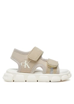 Calvin Klein Jeans Sandały V1B2-83022-1692 Beżowy ze sklepu MODIVO w kategorii Sandały dziecięce - zdjęcie 181176959