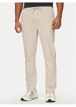 Pepe Jeans Spodnie dresowe Gymdigo Pull On Pant PM211692 Beżowy Regular Fit ze sklepu MODIVO w kategorii Spodnie męskie - zdjęcie 181177259