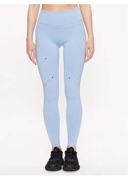 On Legginsy Performance Tights W 1WD10190896 Niebieski Athletic Fit ze sklepu MODIVO w kategorii Spodnie damskie - zdjęcie 181178138