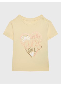 Guess T-Shirt A3GI01 K6YW1 Żółty Regular Fit ze sklepu MODIVO w kategorii Koszulki niemowlęce - zdjęcie 181178837