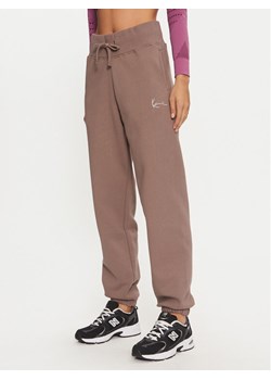 Karl Kani Spodnie dresowe Small Signature 61030014 Beżowy Relaxed Fit ze sklepu MODIVO w kategorii Spodnie damskie - zdjęcie 181180188