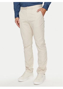 Tommy Hilfiger Chinosy Denton MW0MW25964 Beżowy Straight Fit ze sklepu MODIVO w kategorii Spodnie męskie - zdjęcie 181182067