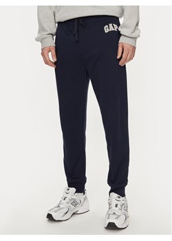 Gap Spodnie dresowe 868463-01 Granatowy Regular Fit ze sklepu MODIVO w kategorii Spodnie męskie - zdjęcie 181182426