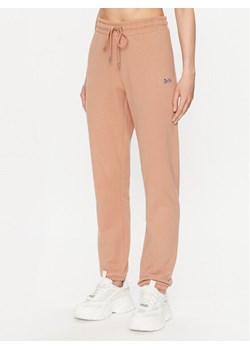 DKNY Sport Spodnie dresowe DP2P3114 Brązowy Regular Fit ze sklepu MODIVO w kategorii Spodnie damskie - zdjęcie 181183255