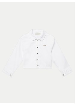 Calvin Klein Jeans Kurtka jeansowa IG0IG02844 Biały Relaxed Fit ze sklepu MODIVO w kategorii Kurtki dziewczęce - zdjęcie 181184999