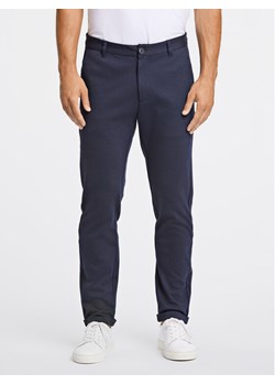Lindbergh Chinosy 30-01007A Granatowy Slim Fit ze sklepu MODIVO w kategorii Spodnie męskie - zdjęcie 181186289