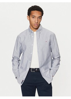 Tommy Jeans Koszula Oxford DM0DM20667 Niebieski Regular Fit ze sklepu MODIVO w kategorii Koszule męskie - zdjęcie 181186558