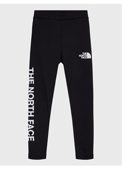 The North Face Legginsy Graphic NF0A82EQ Czarny Slim Fit ze sklepu MODIVO w kategorii Spodnie dziewczęce - zdjęcie 181187197