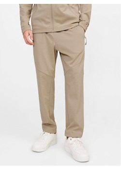 Jack&Jones Spodnie dresowe Will 12253727 Beżowy Slim Fit ze sklepu MODIVO w kategorii Spodnie męskie - zdjęcie 181188119