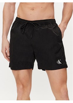 Calvin Klein Swimwear Szorty kąpielowe KM0KM00980 Czarny Regular Fit ze sklepu MODIVO w kategorii Kąpielówki - zdjęcie 181188226