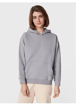 New Balance Bluza Athletics Nature WT23554 Szary Oversize ze sklepu MODIVO w kategorii Bluzy damskie - zdjęcie 181188329