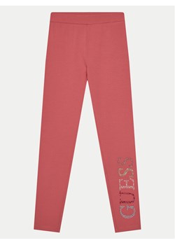 Guess Legginsy J4GB10 J1314 Pomarańczowy Regular Fit ze sklepu MODIVO w kategorii Spodnie dziewczęce - zdjęcie 181188575