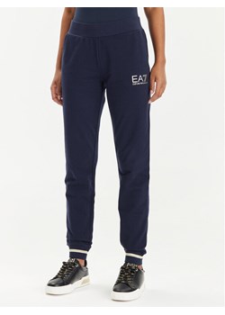 EA7 Emporio Armani Spodnie dresowe 8NTP67 TJTXZ 1554 Granatowy Regular Fit ze sklepu MODIVO w kategorii Spodnie damskie - zdjęcie 181188739