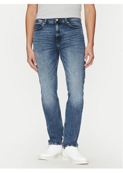 HUGO Jeansy 50530587 Niebieski Slim Fit ze sklepu MODIVO w kategorii Jeansy męskie - zdjęcie 181190128