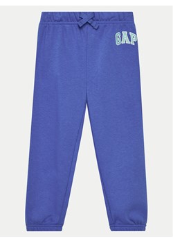 Gap Spodnie dresowe 725227-03 Niebieski Regular Fit ze sklepu MODIVO w kategorii Spodnie chłopięce - zdjęcie 181190196