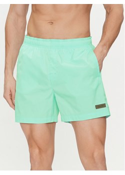Calvin Klein Swimwear Szorty kąpielowe KM0KM00939 Niebieski Regular Fit ze sklepu MODIVO w kategorii Kąpielówki - zdjęcie 181190197