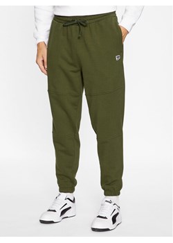 Puma Spodnie dresowe Downtown 621287 Zielony Regular Fit ze sklepu MODIVO w kategorii Spodnie męskie - zdjęcie 181190238
