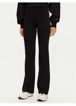 Champion Legginsy 117559 Czarny Flare Fit ze sklepu MODIVO w kategorii Spodnie damskie - zdjęcie 181193096