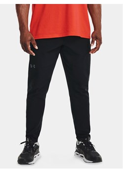 Under Armour Spodnie dresowe Ua Unstoppable Tapered Pants 1352028-001 Czarny Fitted Fit ze sklepu MODIVO w kategorii Spodnie męskie - zdjęcie 181193237