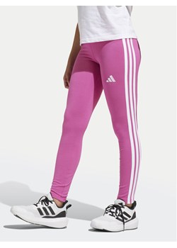 adidas Legginsy Essentials JJ3450 Różowy Slim Fit ze sklepu MODIVO w kategorii Spodnie dziewczęce - zdjęcie 181194096